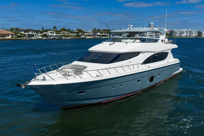 Slide: The Image of Luxurious 2013 Hatteras 80 Motor Yacht cruising on a sunny day. - 60