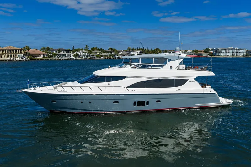 Slide: The Image of Luxury 2013 Hatteras 80 Motor Yacht cruising on a sunny day. - 63