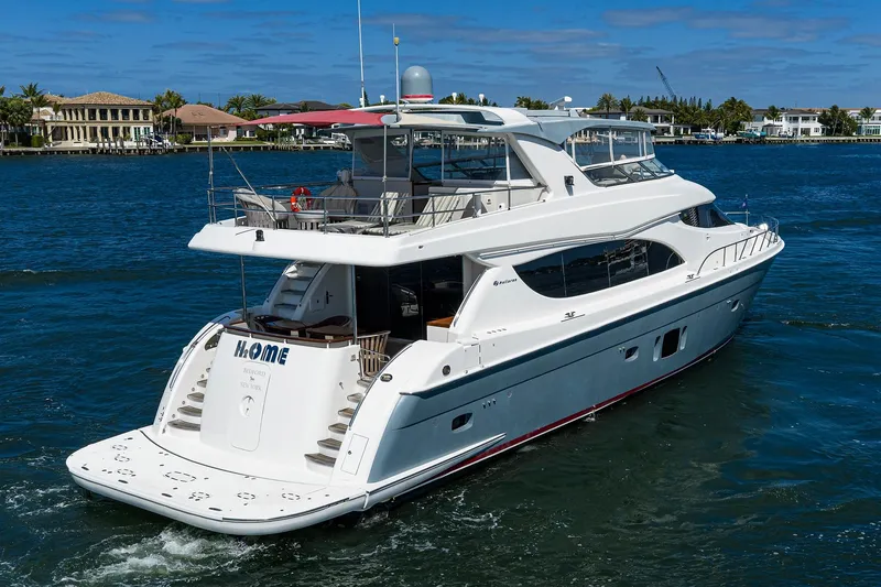 Slide: The Image of 2013 Hatteras 80 Motor Yacht cruising on a sunny day, showcasing luxury and elegance. - 68