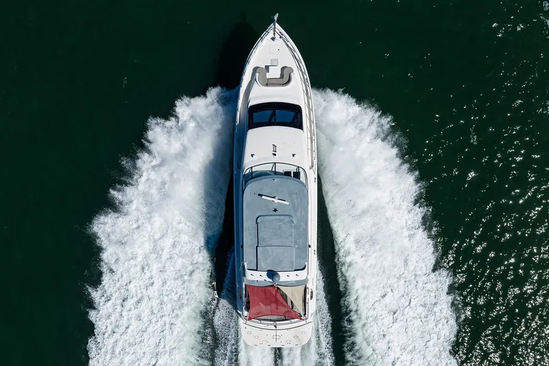 Slide: The Image of Aerial view of 2013 Hatteras 80 Motor Yacht cruising on water. - 85
