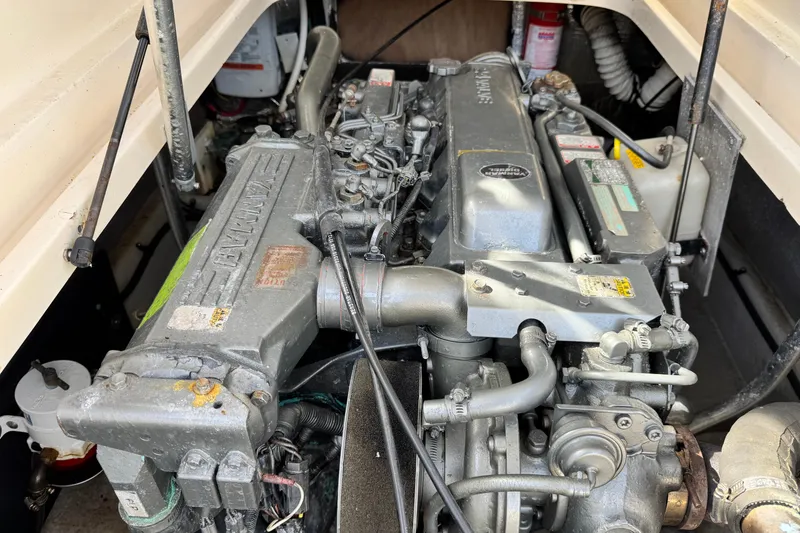 Slide: The Image of Engine compartment of a 2004 Mainship Pilot 30 Rum Runner boat. - 25