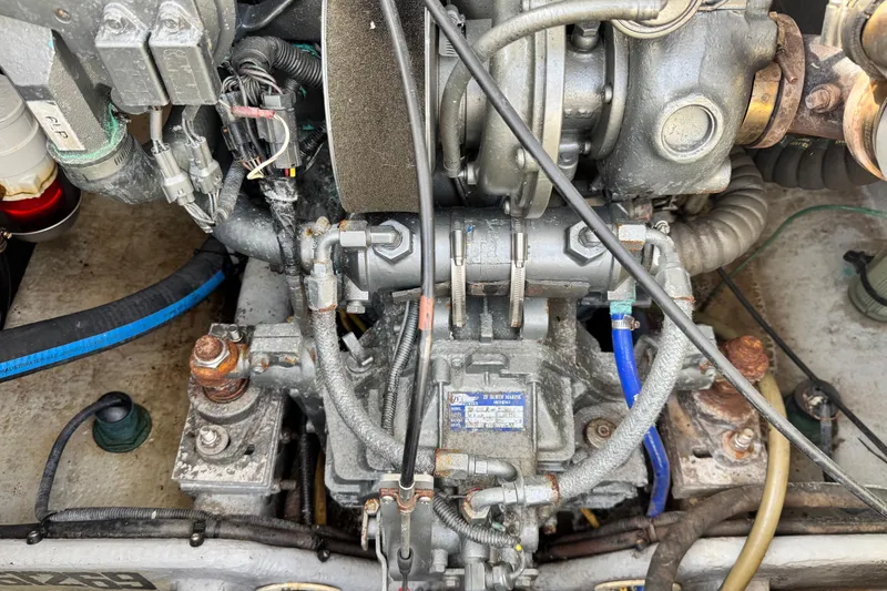 Slide: The Image of Engine compartment of a 2004 Mainship Pilot 30 Rum Runner boat. - 27