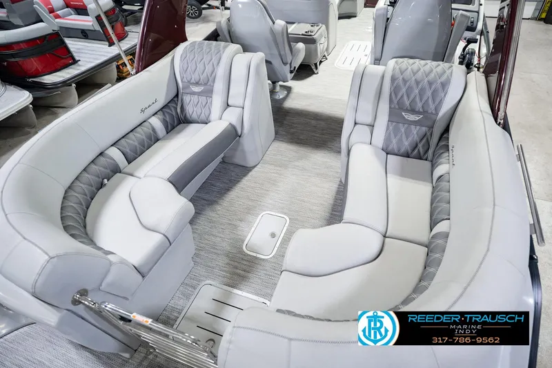 Slide: The Image of Luxurious interior of 2022 Bennington 23 QXFBA pontoon boat with plush seating. - 14