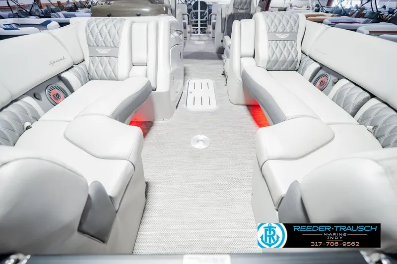 Slide: The Image of Luxurious interior of 2022 Bennington 23 QXFBA pontoon boat with plush seating. - 17