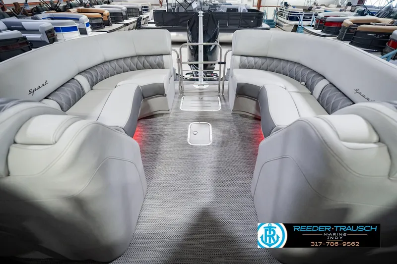 Slide: The Image of 2022 Bennington 23 QXFBA pontoon boat interior with luxurious seating and modern design. - 20