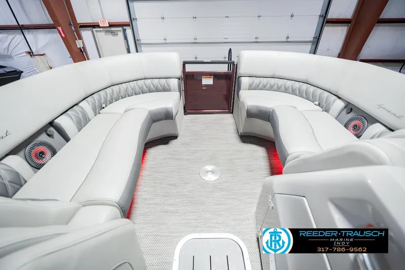 Slide: The Image of Luxurious interior of 2022 Bennington 23 QXFBA pontoon boat with plush seating. - 24