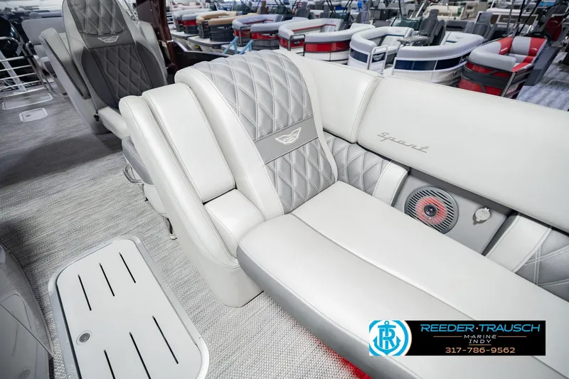 Slide: The Image of Luxurious interior of 2022 Bennington 23 QXFBA pontoon boat with quilted seating. - 26