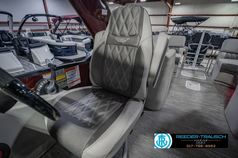 Slide: The Image of Luxurious interior of 2022 Bennington 23 QXFBA boat with plush seating in showroom. - 42
