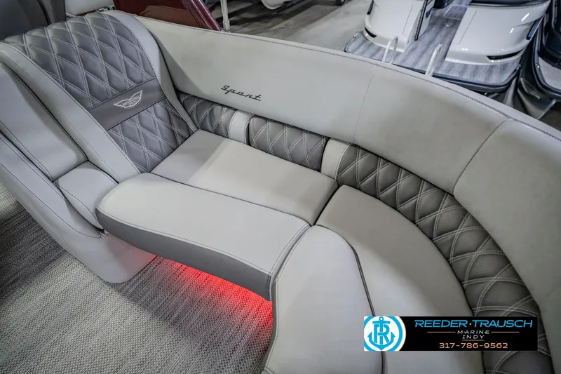 Slide: The Image of Luxurious seating in 2022 Bennington 23 QXFBA boat with elegant diamond stitching and ambient lighting. - 44