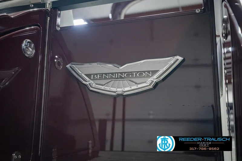 Slide: The Image of 2022 Bennington 23 QXFBA boat emblem with Reeder-Trausch Marine logo. - 55