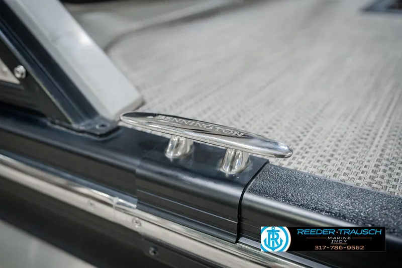 Slide: The Image of 2022 Bennington 23 QXFBA boat cleat detail with Reeder Trausch Marine logo. - 59