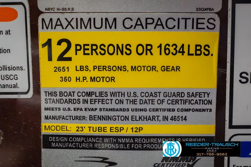Slide: The Image of 2022 Bennington 23 QXFBA boat capacity label, 12 persons or 1634 lbs, 350 HP motor. - 60