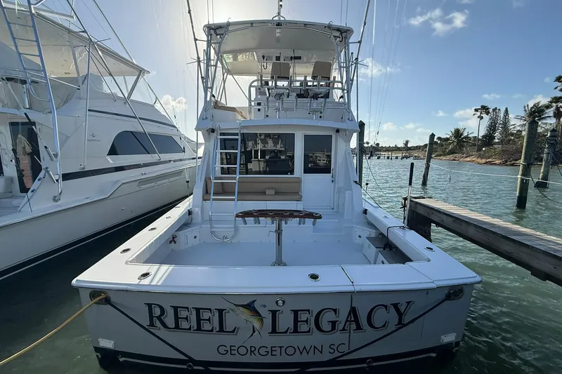 The Image of 1992 Viking 50 Convertible yacht docked, named "Reel Legacy," in Georgetown, SC marina. - 0