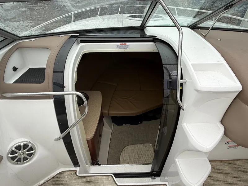 Slide: The Image of Interior of a 2008 Cobalt 303 yacht with cabin entrance. - 11