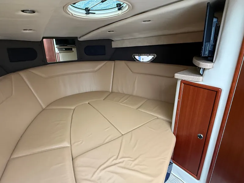 Slide: The Image of Kitchen area in a 2008 Cobalt 303 yacht with sink and stove. - 12