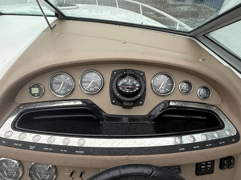 Slide: The Image of Dashboard of a 2008 Cobalt 303 boat with instruments. - 24