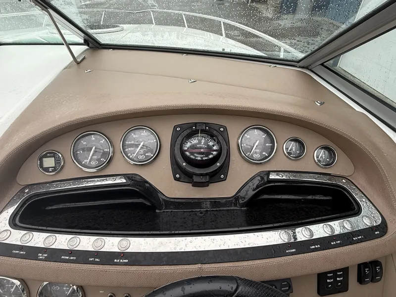 Slide: The Image of Dashboard of a 2008 Cobalt 303 boat with instruments. - 8