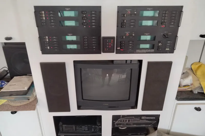 Slide: The Image of Entertainment and control panel on a 1990 Mainship 41 Grand Salon yacht. - 10