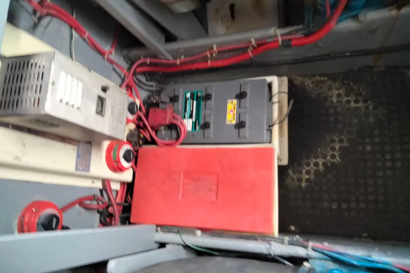 Slide: The Image of Electrical system of a 1990 Mainship 41 Grand Salon with battery and wiring. - 13