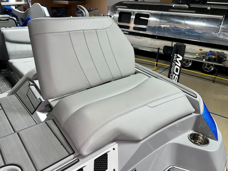 Slide: The Image of 2021 Supra SE 450 boat seat with gray upholstery. - 11