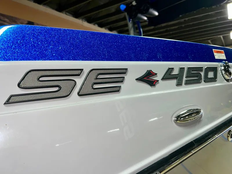 Slide: The Image of Close-up of Supra SE 450 boat logo, 2021 model. - 30