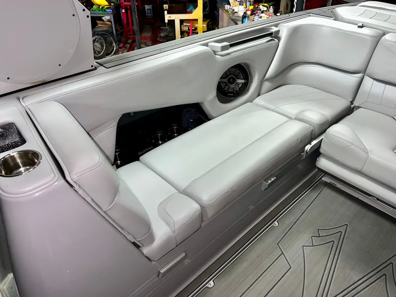 Slide: The Image of Interior of a 2021 Supra SE 450 with gray leather seating. - 7