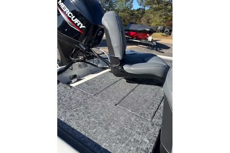 Slide: The Image of 2026 Tracker Pro 170 boat with Mercury engine and gray seating. - 15