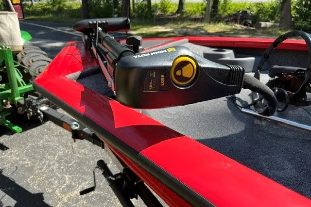 Slide: The Image of Red 2026 Tracker Pro Team 175 Crappie Edition boat with Minn Kota trolling motor. - 13