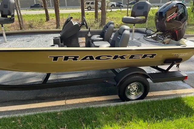 The Image of 2026 Tracker Pro Team 195 boat on trailer, parked outdoors. - 0