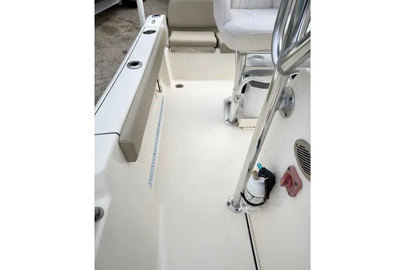 Slide: The Image of 2023 Key West 189 FS boat interior with seating and safety equipment. - 10