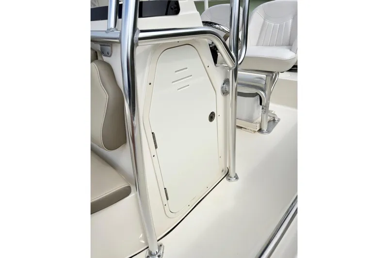 Slide: The Image of 2023 Key West 189 FS boat interior with seating and storage compartment. - 12