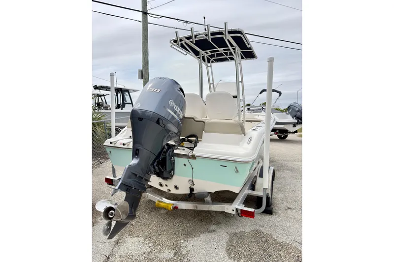 Slide: The Image of 2023 Key West 189 FS boat with Yamaha outboard motor on trailer. - 7