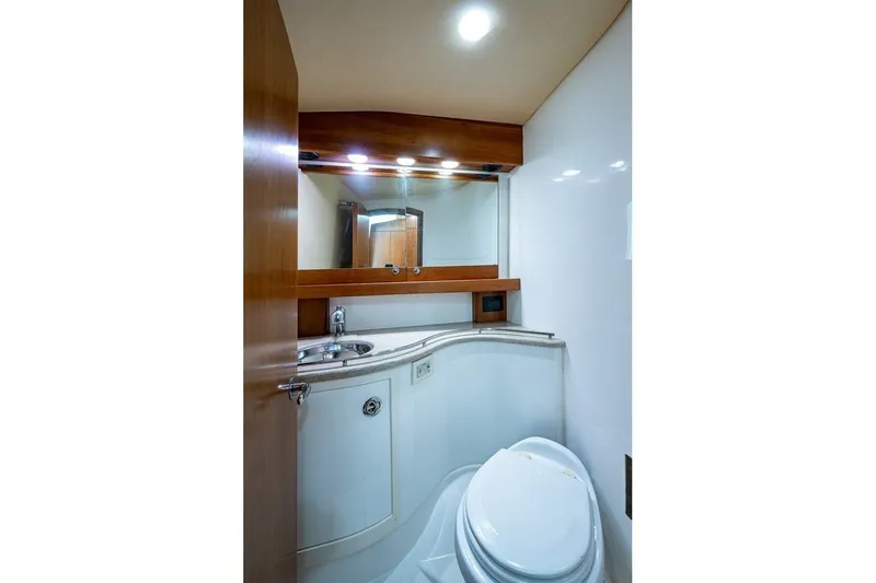 Slide: The Image of Luxurious bathroom in 2012 Brooks Boatworks 34 yacht with modern fixtures and lighting. - 14