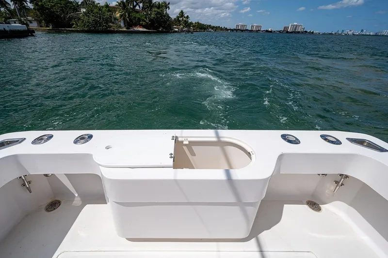 Slide: The Image of Stern view of 2012 Brooks Boatworks 34 on open water, clear sky. - 6