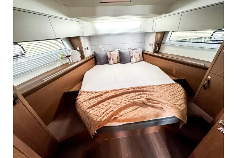 Slide: The Image of Interior of 2026 Beneteau Antares 12 Coupe featuring cozy bedroom. - 17