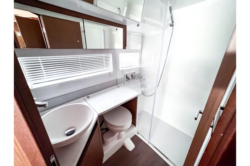 Slide: The Image of Modern bathroom in Beneteau Antares 12 Coupe 2026 boat. - 19