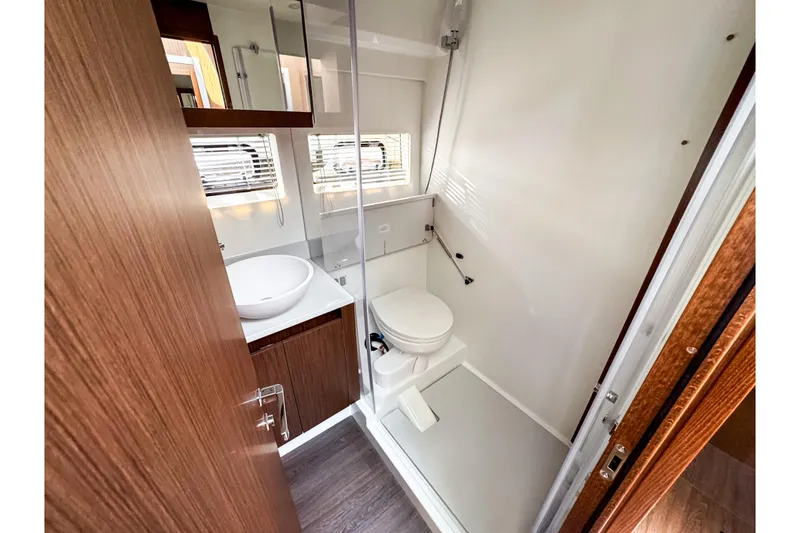 Slide: The Image of Interior view of Beneteau Antares 12 Coupe 2026 bathroom. - 23