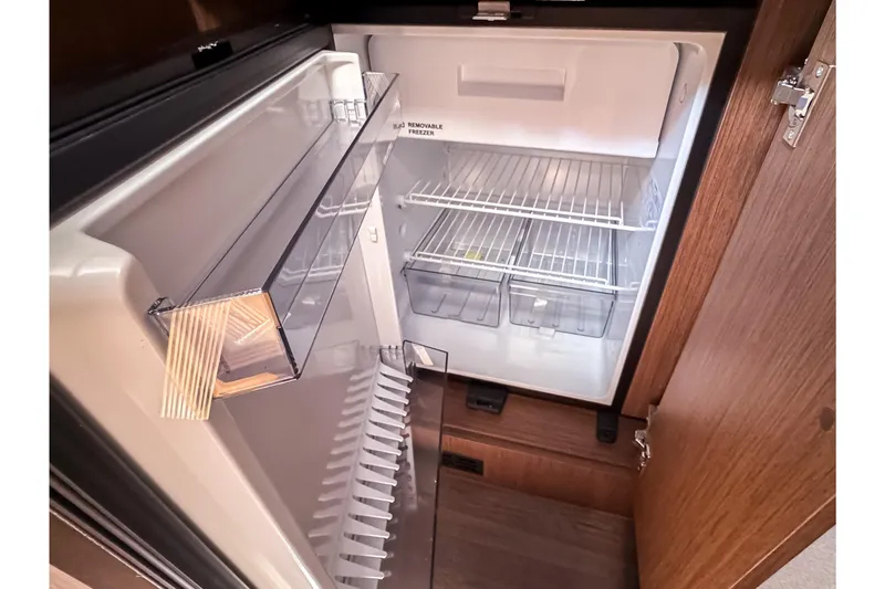 Slide: The Image of Interior view of refrigerator on Beneteau Antares 12 Coupe 2026. - 28