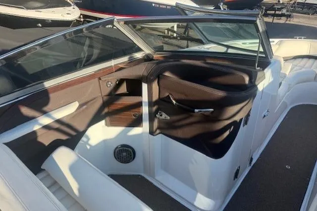 Slide: The Image of Interior of a 2015 Cobalt R5 boat, featuring sleek seating and modern design elements. - 14