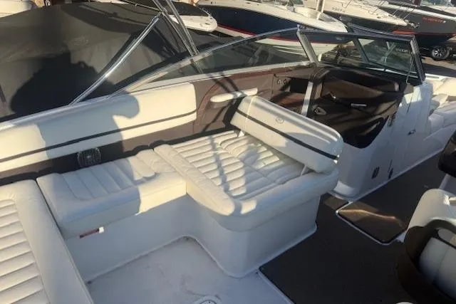 Slide: The Image of 2015 Cobalt R5 boat interior with white seating and sleek design. - 17