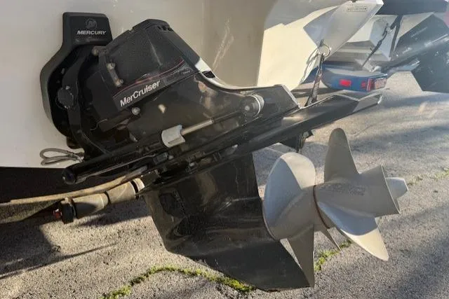 Slide: The Image of MerCruiser engine on a 2015 Cobalt R5 boat, featuring a dual propeller system. - 33
