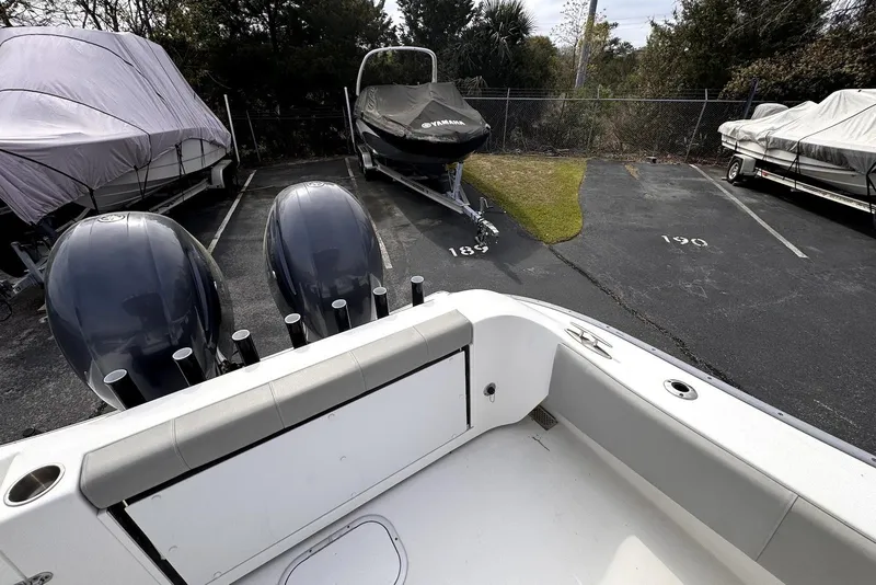 Slide: The Image of 2020 Cape Horn 27 XS boat with triple engines in parking lot. - 23