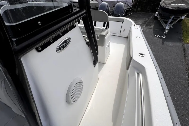 Slide: The Image of 2020 Cape Horn 27 XS boat interior with seating and console details. - 26