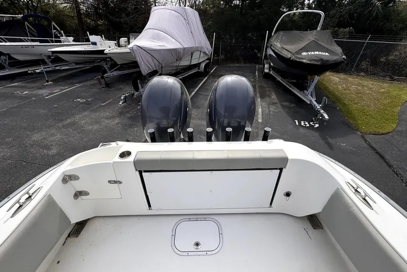 Slide: The Image of 2020 Cape Horn 27 XS boat with dual engines in a parking lot. - 29