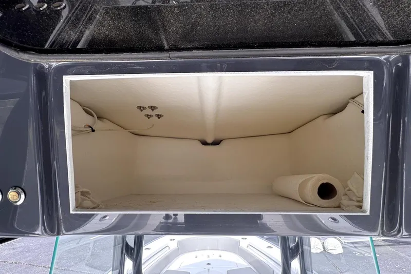 Slide: The Image of Storage compartment of a 2020 Cape Horn 27 XS boat, featuring a clean interior. - 34