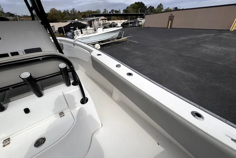 Slide: The Image of 2020 Cape Horn 27 XS boat interior with rod holders and spacious deck. - 35