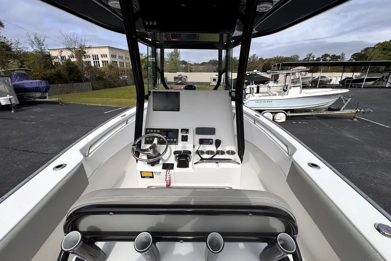 Slide: The Image of 2020 Cape Horn 27 XS boat interior with steering console and navigation equipment. - 38