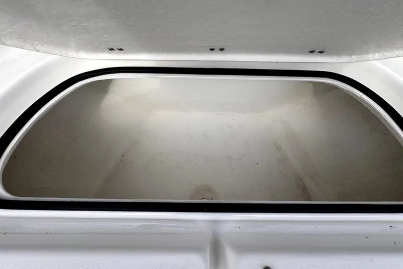 Slide: The Image of Open storage compartment of 2020 Cape Horn 27 XS boat. - 43
