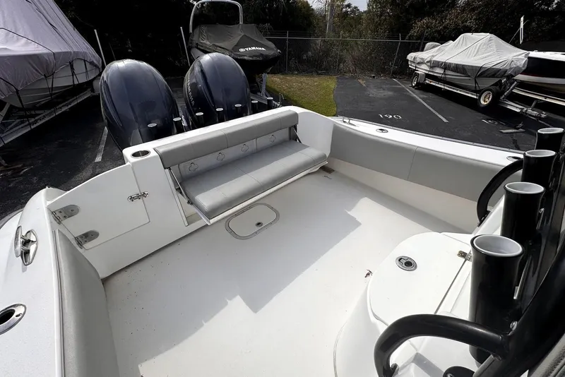 Slide: The Image of 2020 Cape Horn 27 XS boat interior with seating and dual outboard motors. - 46