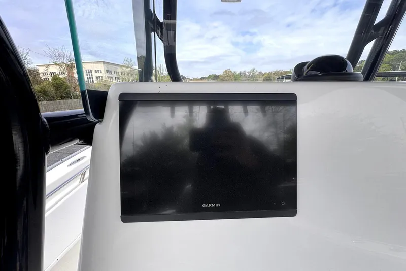 Slide: The Image of Garmin display on 2020 Cape Horn 27 XS boat dashboard, outdoors. - 48